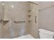 Shower with built-in shelving and safety handle at 3902 Shoreside Cir, Tampa, FL 33624