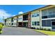 The exterior of this charming condo features a well-maintained facade and lush landscaping at 416 73Rd N Ave # 206, St Petersburg, FL 33702