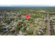 Aerial view shows the property's position in a leafy neighborhood setting, marked by a distinctive home icon for easy identification at 4307 Foxglen Ln, Tampa, FL 33624