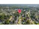 Aerial view of property marked within a lush neighborhood setting, showcasing its location within a vibrant community of well kept homes at 4307 Foxglen Ln, Tampa, FL 33624