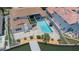 Beautiful backyard featuring a swimming pool, brick pavers, and lovely landscaping at 451 Palm Ne Is, Clearwater Beach, FL 33767