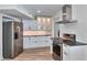 Bright kitchen with stainless steel appliances, white cabinetry, and modern hardware at 451 Palm Ne Is, Clearwater Beach, FL 33767