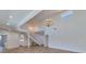 Bright living room with wood floors, high ceilings, and an elegant chandelier at 451 Palm Ne Is, Clearwater Beach, FL 33767