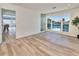 Bright living room with wood floors and a view of the canal at 451 Palm Ne Is, Clearwater Beach, FL 33767
