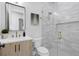 Modern bathroom featuring a glass-enclosed shower and sleek vanity at 468 44Th N Ave, St Petersburg, FL 33703