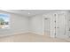 Bright bedroom features light wood floors, large windows, and neutral paint, creating a welcoming atmosphere at 468 44Th N Ave, St Petersburg, FL 33703