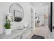 Inviting foyer with a contemporary mirror, console table, and view into the open-concept living space at 468 44Th N Ave, St Petersburg, FL 33703
