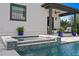 This pristine pool has an attached hot tub, perfect for relaxing and enjoying the outdoor space at 468 44Th N Ave, St Petersburg, FL 33703