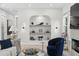 Bright living room with stylish decor, fireplace, and elegant modern furnishings at 468 44Th N Ave, St Petersburg, FL 33703