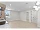 Bright and airy living space with light hardwood floors, fresh white paint, and recessed lighting at 468 44Th N Ave, St Petersburg, FL 33703
