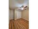 A spacious bedroom with wood floors and a closet at 5110 Corvette Dr, Tampa, FL 33624