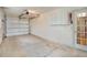 A spacious garage features painted walls and tile flooring at 5390 Magnolia N Trl, Pinellas Park, FL 33782