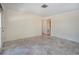 Bright living room features neutral paint, tile floors, and ample natural light at 5390 Magnolia N Trl, Pinellas Park, FL 33782