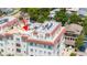 Close up of a condo building featuring a rooftop patio area for resident recreation and relaxation at 610 S Rome Ave # 602, Tampa, FL 33606