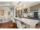 Spacious kitchen with marble island, stainless steel appliances, and custom cabinetry at 610 S Rome Ave # 602, Tampa, FL 33606