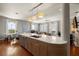 Expansive living space featuring kitchen island, living room, and dining area at 610 S Rome Ave # 602, Tampa, FL 33606