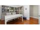 Office space featuring large bookshelves and a white conference style table at 610 S Rome Ave # 602, Tampa, FL 33606