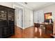 Lovely office space featuring hardwood floors, vintage desk, and plentiful light at 610 S Rome Ave # 602, Tampa, FL 33606