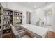 Bright home office with custom shelving and a large conference style table at 610 S Rome Ave # 602, Tampa, FL 33606