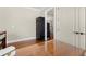 Home office area with dark wood floors and view to another office area at 610 S Rome Ave # 602, Tampa, FL 33606