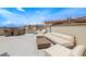 Relaxing rooftop terrace with comfortable seating, dining area, and city views at 610 S Rome Ave # 602, Tampa, FL 33606