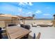 Well-appointed rooftop patio featuring dining and lounge areas, perfect for entertaining and relaxation at 610 S Rome Ave # 602, Tampa, FL 33606