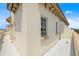 Corner rooftop view showcasing architectural details, windows, and a glimpse of the scenic surroundings at 610 S Rome Ave # 602, Tampa, FL 33606