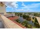 Breathtaking rooftop view overlooking a serene lake, lush greenery, and the city skyline at 610 S Rome Ave # 602, Tampa, FL 33606
