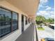 Balcony view showcasing the outdoor landscape and proximity to parking in this condo community at 635 30Th W Ave # F309, Bradenton, FL 34205