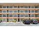 A well-maintained condo building with balconies, parking, and landscaping showing the exterior of this property at 635 30Th W Ave # F309, Bradenton, FL 34205