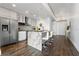 Modern condo kitchen with stainless steel appliances, granite countertops, and eat-in bar with seating at 777 N Ashley Dr # 2312, Tampa, FL 33602