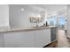 Bright kitchen featuring stainless steel appliances, granite countertops, and eat-in bar with seating at 777 N Ashley Dr # 2312, Tampa, FL 33602