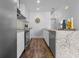 Bright kitchen featuring stainless steel appliances, granite countertops, and ample cabinet space at 777 N Ashley Dr # 2312, Tampa, FL 33602