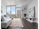 Modern living room with floor-to-ceiling windows offering stunning city views and plenty of natural light at 777 N Ashley Dr # 2312, Tampa, FL 33602