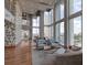Bright lounge area boasts floor-to-ceiling windows with abundant natural light and beautiful views of the cityscape at 777 N Ashley Dr # 2312, Tampa, FL 33602