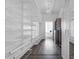 Generous walk-in closet features custom shelving and stylish chandelier lighting at 777 N Ashley Dr # 2312, Tampa, FL 33602