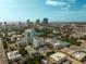 Take in the expansive aerial view featuring the skyline, lake, and lush greenery at 851 3Rd Ave N, St Petersburg, FL 33701