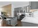 Beautiful kitchen with stainless steel appliances, modern gray cabinets, and a functional center island at 851 3Rd Ave N, St Petersburg, FL 33701