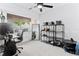 Bright office with a desk, rolling chair, a window view, mirror, and shelving unit at 851 3Rd Ave N, St Petersburg, FL 33701