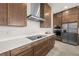 Well-appointed kitchen featuring sleek countertops, stainless steel appliances, and ample cabinet space at 8612 Ivy Stark Blvd, Wesley Chapel, FL 33545