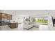 Open-concept living space featuring modern furnishings, a kitchen island, and seamless access to the outdoors at 8612 Ivy Stark Blvd, Wesley Chapel, FL 33545
