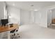 Bright home office with neutral carpet and lots of natural light at 8612 Ivy Stark Blvd, Wesley Chapel, FL 33545