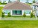 A backyard with a privacy fence and manicured lawn at 8749 Drummer Plank Dr, Wesley Chapel, FL 33545