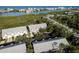 Scenic aerial view of the neighborhood showcasing lush greenery and waterfront proximity at 9660 Tara Cay Ct # 38, Seminole, FL 33776