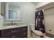 Renovated bathroom with stylish vanity, modern fixtures, and walk-in shower with elegant tile work at 9660 Tara Cay Ct # 38, Seminole, FL 33776