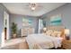 Bedroom with a coastal-themed decor and natural light at 9660 Tara Cay Ct # 38, Seminole, FL 33776