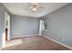 Bedroom featuring a ceiling fan, neutral walls, and carpet flooring at 9660 Tara Cay Ct # 38, Seminole, FL 33776