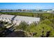 A picturesque view of charming townhouses with scenic waterfront in the background at 9660 Tara Cay Ct # 38, Seminole, FL 33776