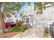 Charming townhome with a one-car garage and a covered front porch at 9660 Tara Cay Ct # 38, Seminole, FL 33776