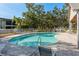 A stunning, inviting community pool with comfortable lounge chairs and easy access at 9660 Tara Cay Ct # 38, Seminole, FL 33776
